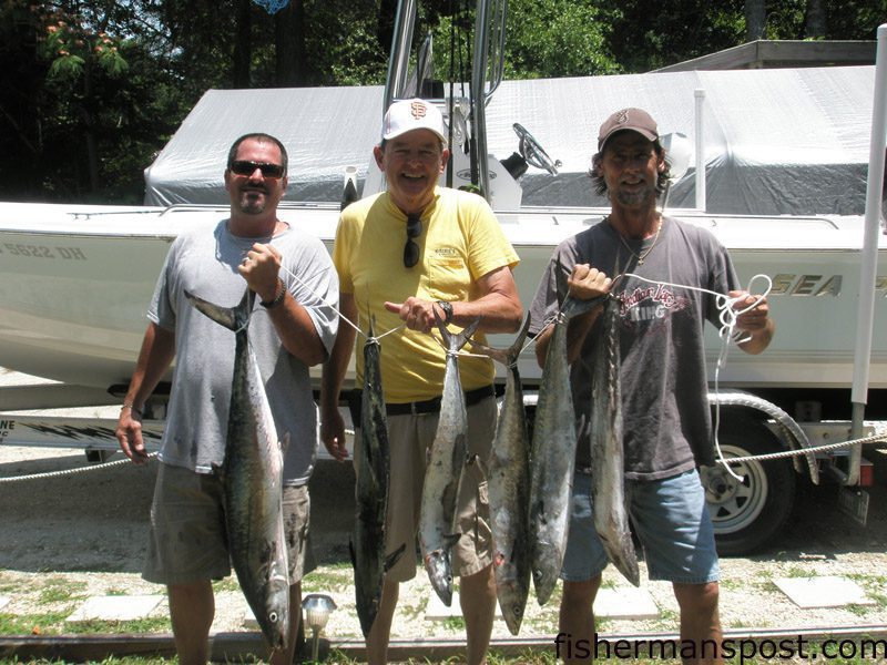 Mr. Pittman, Paul Pittman, and Eric Yoerk with a brace of king mackerel they hooked near Honeymoon Rock.