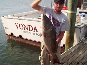 Clayton Parcell, of Hillsboro, OH, with a 20 lb. gag grouper he hooked on squid. He was fishing out of Topsail Beach on the headboat "Vonda Kay" with Capt. Dave Gardner.