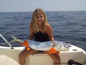Sara Riggs, of Scotts Hill, NC, with a dolphin she hooked 8 miles off Topsail Inlet while fishing with her father Mark.