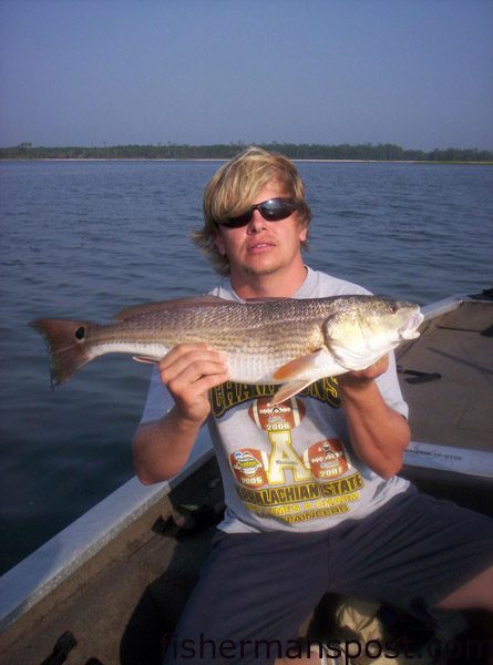 J.T. Clarke, from Monroe, NC, with a 25" red drum he hooked on a Rapala Skitterwalk near Morehead City while fishing with Daniel Griffee.