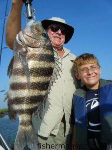 Tom Temple and his grandson Michael with an 8 lb. sheepshead they hooked while fishing some inshore structure with Capt. Jeff Cronk of Fish'N4Life Charters out of Swansboro.