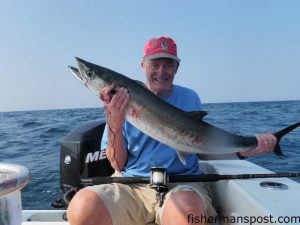 Arthur Brownell with a 30 lb. king mackerel he hooked on a cigar minnow on a Blue Water Candy dead bait rig near Honeymoon Rock. He was fishing with Capt. Jim Sabella of Plan 9 Charters out of Topsail Beach.