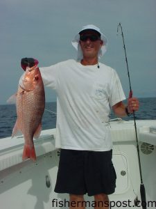 Frank Colonna with a 9.25 lb. American red snapper he hooked at some bottom structure 25 miles off Wrightsville Beach while fishing with his son and friends on the "In My Dreams."