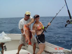 Joni Barnes, from Holly Springs, NC, with a 10 lb. American red snapper she hooked on a half cigar minnow in 80'. She was fishing out of Carolina Beach with Capt. Tommy Sayre and mate Scotty Warren on "The Mate."