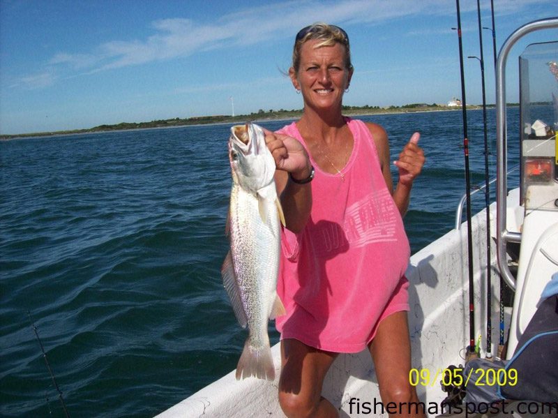 Leslie Whitford, of Morehead City, with a big gray trout that fell for a spec rig tipped with shrimp in Beaufort Inlet.
