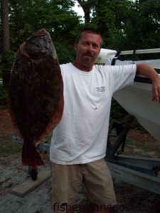 Capt. Jamie Rushing, of Seagate Charters, with a 6.25 lb. flounder caught in the ocean off Carolina Beach on a live finger mullet while fishing with Capt. Blair White.