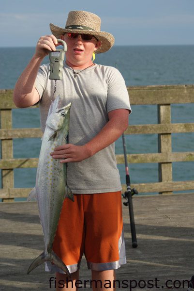 Alan Jo Pleasant, of Fuquay-Varina, NC, with an 8 lb., 6 oz. spanish mackerel that fell for a live mullet on a king rig off Jolly Roger Pier.