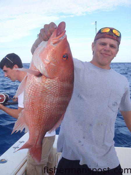 Capt. Caleb Rivers, of Fintuition Charters, with a 10 lb. American red snapper that fell for a cigar minnow 35 miles off Beaufort Inlet.