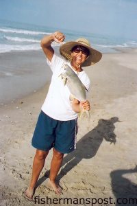 Gwen Peddles with a 2 lb. 11 oz. pompano caught from the Emerald Isle surf.