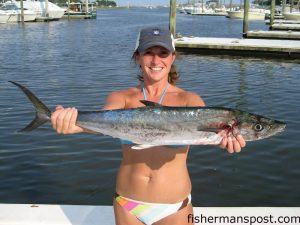 Lori Herring with a king mackerel that fell for a Yo-Zuri Deep Diver near the Masonboro sea buoy while she was fishing aboard the "Santiago."