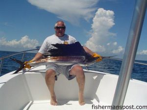 Chris Franks, of Boiling Spring Lakes, NC, with a sailfish he hooked and released at Lighthouse Rocks on a live pogy while fishing on the "Capt. Krunch."