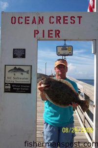 Manuel Bryant with a 4 lb., 10 oz. flounder he hooked on a live bait while fishing from Ocean Crest Pier.