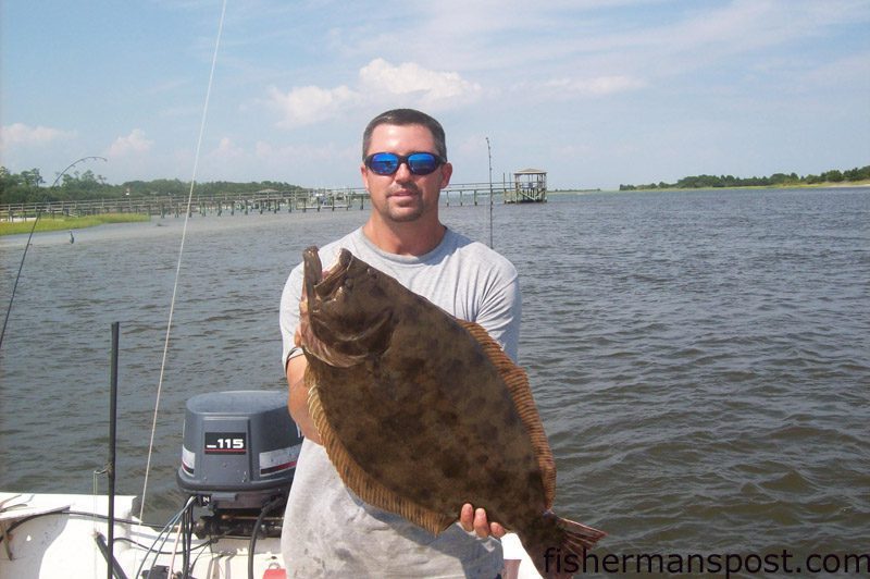 Dennis Durham, of Wilmington, with a 10 lb., 6 oz. flounder he hooked on a live pogy in the Cape Fear River.