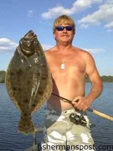 Richard Ricks, of Goldsboro, NC, with a 7 lb. flounder he hooked on a live pogy in the Neuse River near Bayboro, NC.