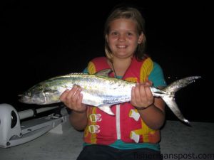 McKenna Fulcher (age 10) with a 25" spanish mackerel she hooked in Beaufort Inlet while trolling Clarkspoons with her father after dark.