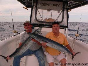Tim Thoman and Craig Jenkins with a pair of wahoo they hooked while trolling ballyhoo at the Swansboro Hole with Capt. Lynn Hinnant of Fishinnant Charters out of Sneads Ferry.