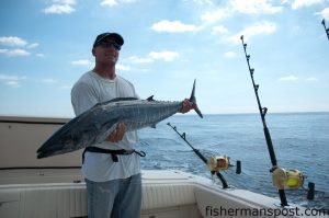 Bob Sylverstein, of Wilmington, with a 35 lb. wahoo he hooked at the Steeples on a red/black-skirted ballyhoo behind a planer at the Steeples while fishing out of Southport on the "Theseus."