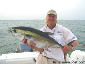 Capt. Tres Kirkland, of Carolina Saltwater Charters, with a 30.5 lb. blackfin tuna he hooked off Ocean Isle in 70' of water.