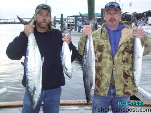 Jonathan Williams, of Ramseur, NC, and Kevin Hiatt, of Archdale, NC, with a king mackerel and a a pair of large spanish they hooked on cigar minnows under blue/pink Pirate Plugs around 18 Mile Rock while they were fishing with Capts. Butch and Chris Foster of Yeah Right Charters.