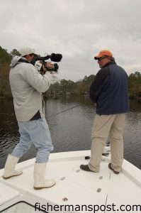 Capt. Bryan Goodwin, of Native Guide Service and the Down East Outdoors TV show, films Capt. Gary Dubiel, of Spec Fever Guide Service, as he talks about soft plastic techniques for stripers in the deeper water of Brice's Creek just off of the Neuse.