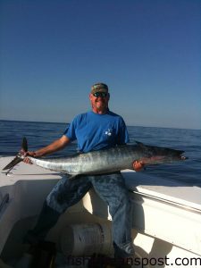 Pat Renfro with a wahoo that fell for a skirted ballyhoo near The Rise while he was trolling on the "Big Dawg" out of Sneads Ferry.