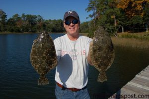 Marty Worth, from New York, with a couple of 18" flounder caught in Howe Creek on a Gulp-tipped bucktail.