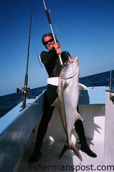 Capt. Savannah Batson with a 60 lb. amberjack she hooked on a cigar minnow while fishing some bottom structure 40 miles off Carolina Beach Inlet. The jack fell for a cigar minnow.