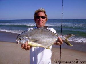 Kevin Blake, of Kure Beach, with a 3.2 lb. pompano he hooked on shrimp in the Fort Fisher surf.