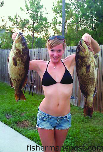 Becky Flatley, of Huntingtown, MD, with a pair of gag grouper that bit northern mackerel at a ledge 18 miles off Rich’s Inlet while she was fishing with her boyfriend, Jason Alberti, and family.