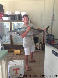 Harrison Hall with a 33 lb. king mackerel that bit a live bait off the end of Johnnie Mercer's Pier.
