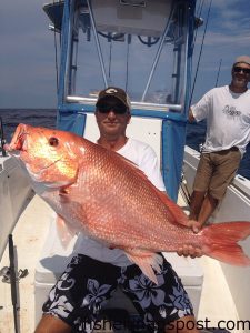 Bryan Williams with a 26 lb. red snapper that bit a dead cigar minnow in 120' of water off Morehead City while he was fishing with Nick Maraveyias on the "Seabiscuit."