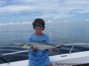 Bennett Brantley with a stout spanish mackerel that bit a skirted cigar minnow in 60' of water off Wrightsville Beach while he was trolling with his father.