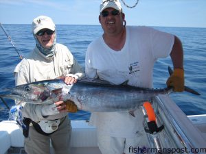 Donald and Capt. Russell Weaver with a 40 lb. wahoo that bit a ballyhoo under a blue/crystal Blue Water Candy JAG at the Swansboro Hole.