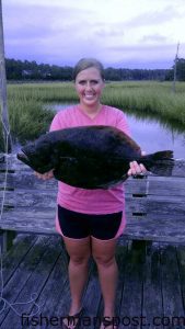 Sara Smith, of Southport, with her first citation flounder, a 7 lb., 15 oz. fish that bit a live finger mullet near Walden's Creek.