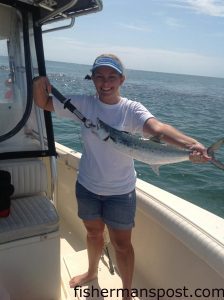 Lauren Auton, of Wilmington, with 4.5 lb. spanish mackerel that bit a live finger mullet at the Cape Lookout Rock Jetty.
