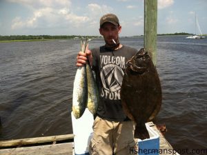 Israel Malpass, of Wilmington, with a pair of peanut dolphin and a 10 lb., 7 oz. flounder he hooked on a Gulp-tipped bucktail jig at some nearshore structure off Carolina Beach.