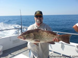 Wayne Rose, of Roper, NC, with a 29" gag grouper he hooked on cut bluefish while fishing off Bogue Inlet on the headboat "Nancy Lee."