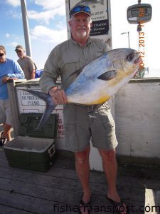 Davy Whittington, of Hudson, NC, with a 22.5 lb. permit that bit a live mullet while he was fishing at Yaupon Reef.