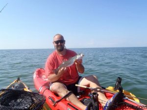 Tony Kazulen with a 20" speckled trout that fell for a soft plastic bait while he was fishing the Pamlico Sound with JAM's Adventures Kayak Fishing.
