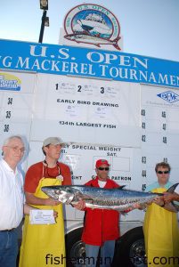 Morehead City's John Lewis, of the "Second Chanze," with the 47.05 lb. king mackerel that earned him over $67,000 as the winner of the 2013 U.S. Open King Mackerel Tournament. Lewis hooked the huge king on a live menhaden near the Cabbage Patch and battled it to the boat solo.