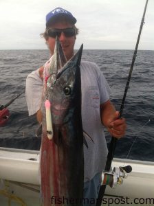Capt. Rob Koraly with a 30 lb. wahoo that struck an 11 oz. Blue Water Candy Roscoe Jig in 400' of water off Beaufort Inlet while he was fishing with Capt. Bobby Freeman on the "Sunrise II" out of Atlantic Beach.