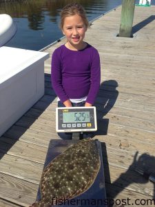Sydney Sauls (age 7) with her first citation flounder, landed at some nearshore structure off Shallotte Inlet while she was fishing with her father, Capt. Brandon Sauls, and Clay Morphis. The big flatfish fell for a live menhaden.