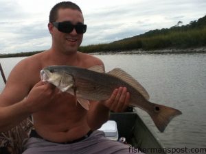 Andrew Sabisch with a red drum that fell for a shrimp in Dunn South while he was fishing with Marshall Rasnick.