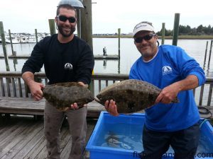 Brad Separk and Donald Aiken with a pair of healthy flounder including the 5.09 lb. fish that earned they and Butch Ramey first place in the 2013 Flat Bottom Girls Flounder Tournament. The flatfish fell for live finger mullet at some nearshore structure in 45' of water off Masonboro Inlet while they were fishing aboard the "Little Money."