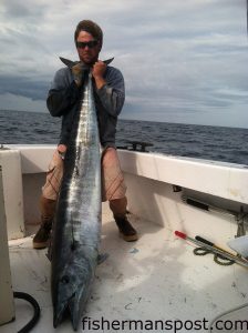 Tim Hagerich with a 90 lb. wahoo that bit a live menhaden on 20 lb. tackle while he was kingfishing 6 miles off Hatteras Inlet with Capt. Andy Piland on the charterboat "Good Times" out of Hatteras Harbor Marina.