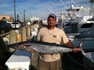 Adam Alberson, of Greensboro, NC, with a 45 lb. wahoo that bit a rigged ballyhoo while he was trolling the Gulf Stream of Morehead City with Capt. Thomas Wood on the "Dancin' Outlaw."