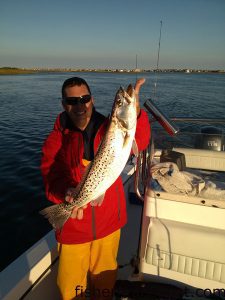 Eric Thompson, of Hampstead, with a citation speckled trout he hooked on a red-headed MirrOlure near New Topsail Inlet while fishing with J.R. Thompson on the "Idol Hour."