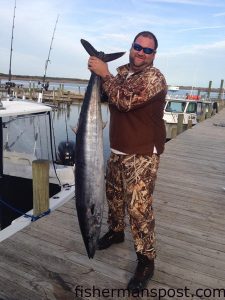 Nick Wells with a 71 lb. wahoo he landed while trolling 60 miles off New River Inlet with Corey Sholar and Ernie James. 