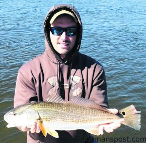Lee Koch with a 25" red drum that strucka  live mud minnow on a float rig near Ocean Isle Beach while he was fishing with Capt. Jacob Firck of J&J Inshore Charters.