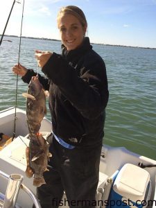 Meghann Bryant, of Mebane, NC, with a pair of 3 lb. tautog that bit shrimp at some nearshore structure in 40' of water off Beaufort Inlet while she was fishing with her fiancee Clint.